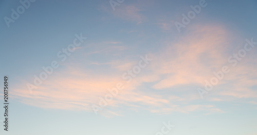Fototapeta Naklejka Na Ścianę i Meble -  Cloudy sky at sunrise for background. A lot of torn clouds .