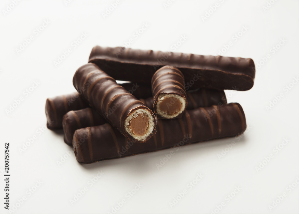 Small chocolate candies isolated on white Small chocolate candies isolated on white