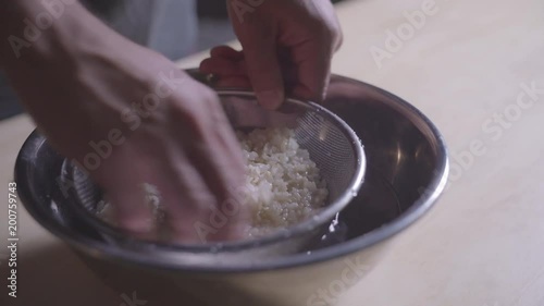 Cooking rice in kitchen
