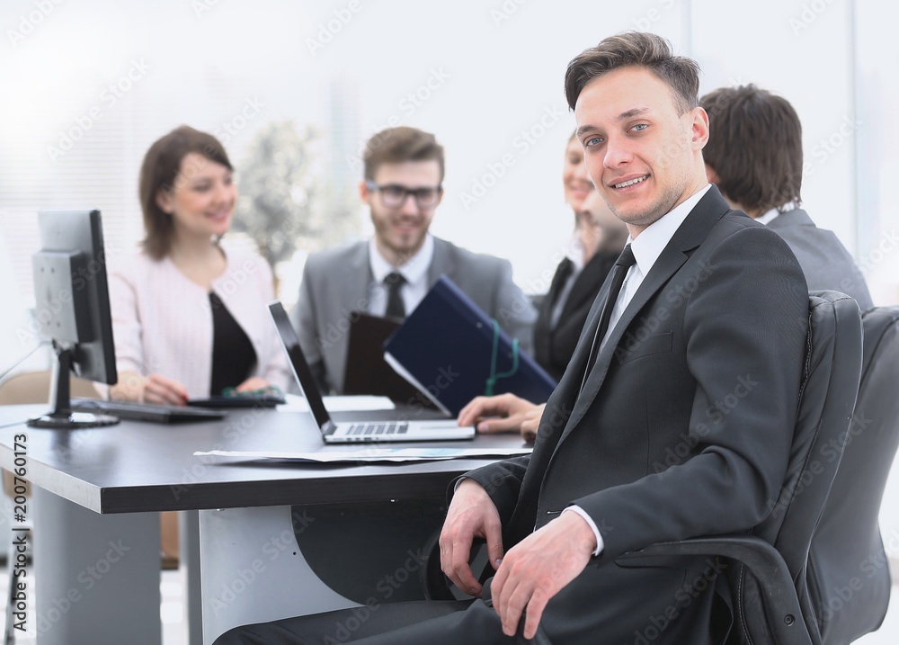 business team with a senior Manager in the foreground business team with a senior Manager in the foreground