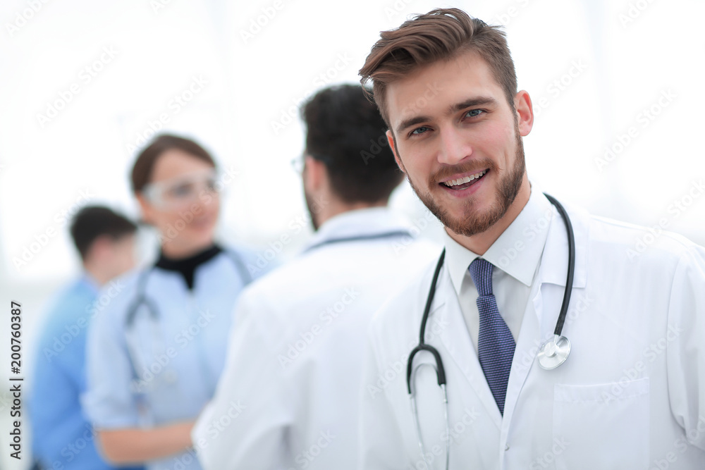 Portrait of friendly male doctor smiling Portrait of friendly male doctor smiling