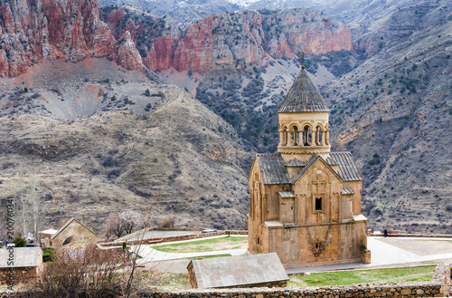 Scenic Novarank monastery in Armenia. Noravank monastery was founded in 1205. It is located 122 km from Yerevan in a narrow gorge made by the Darichay river nearby the city of Yeghegnadzor