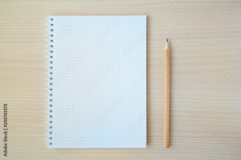 Pencil and pen with notepad. Pencil and pen with notepad.