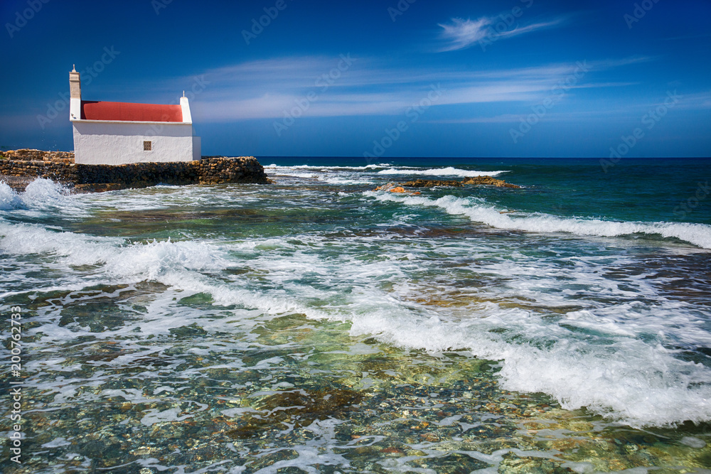 Small church by the sea in Chersonissos on the island of Crete, Greece