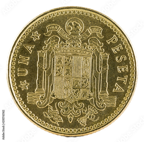 Old Spanish coin of 1 pesetas, Juan Carlos I. Year 1975, 1976 in the stars. Reverse. photo