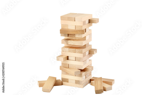 Wooden block tower game isolated on white background photo