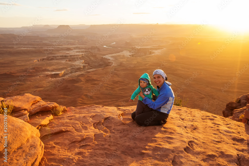A mother and her baby son visit Canyonlands National park in Utah, USA A mother and her baby son visit Canyonlands National park in Utah, USA
