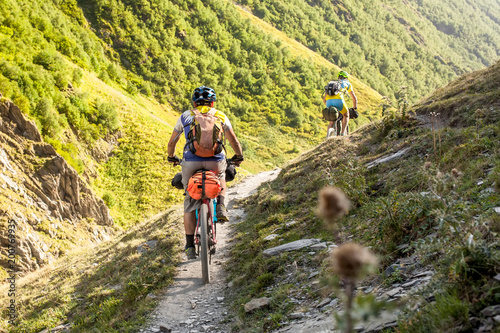 Mountain bikers are travelling in the highlands of Tusheti region  Georgia