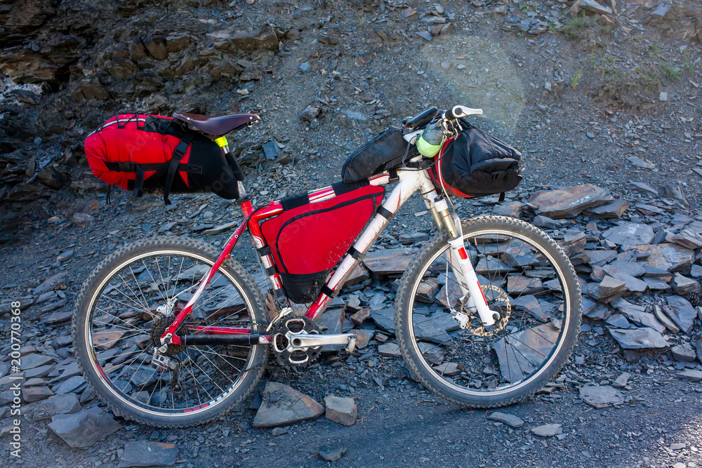 Fototapeta premium Mountain bicycle prepared for distant travel