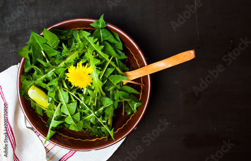 Dandelion salad in a bowl top view