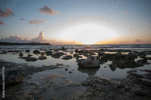 Sunrise on beach in Cancun © Warren