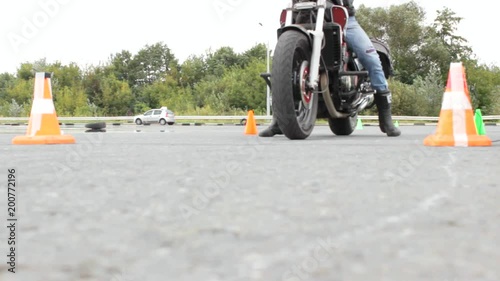 The motorcyclist drove up to the start of the motorcycle, a Moto gymkhana competition photo
