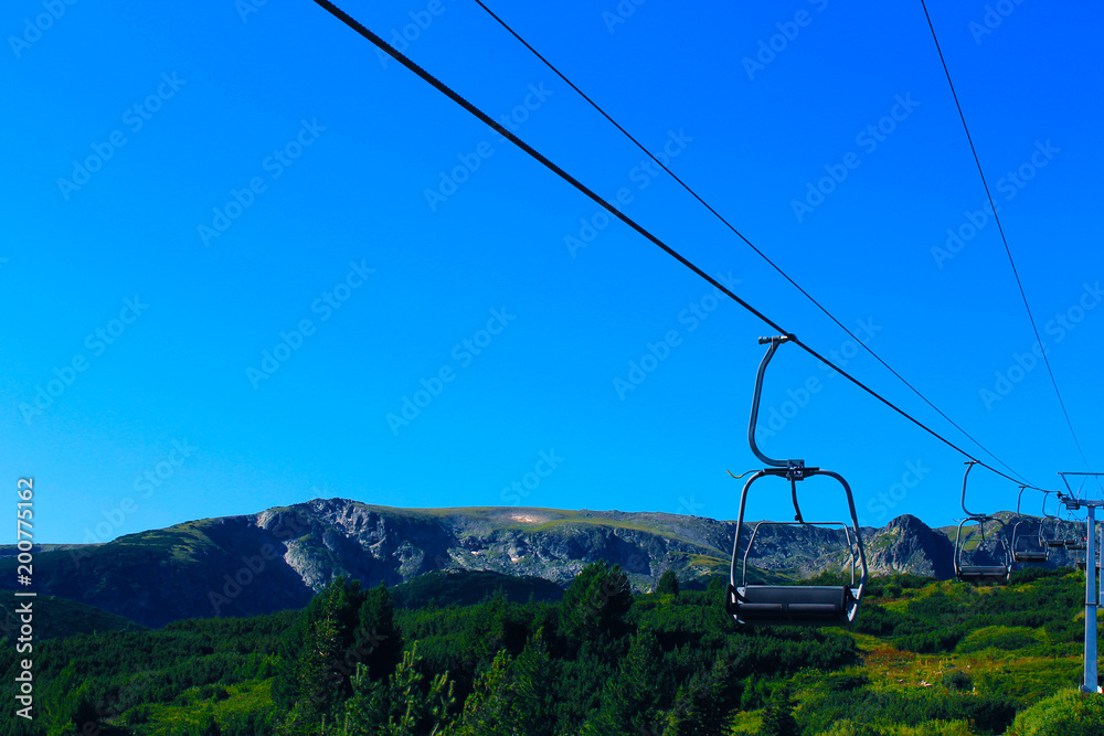 Cabin car in a sunny day in the mountain concept