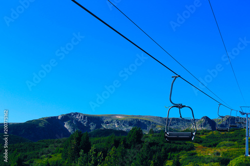 Cabin car in a sunny day in the mountain concept