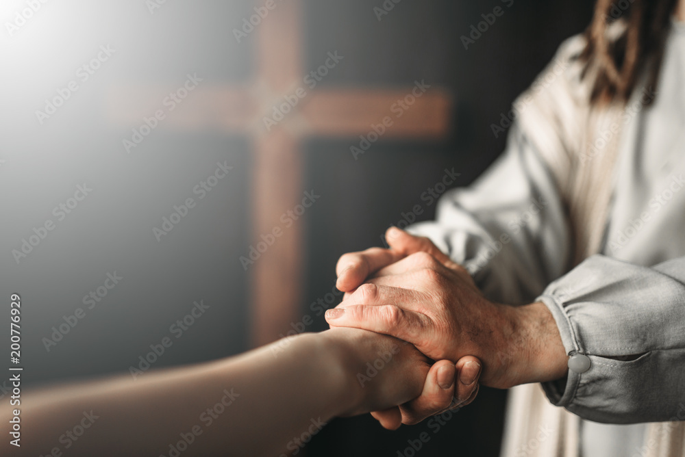 Naklejka premium Jesus Christ gives a helping hand to the faithful
