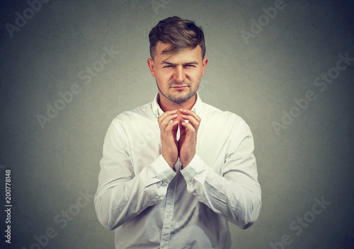 Obraz na plátně Sly young man planning revenge
