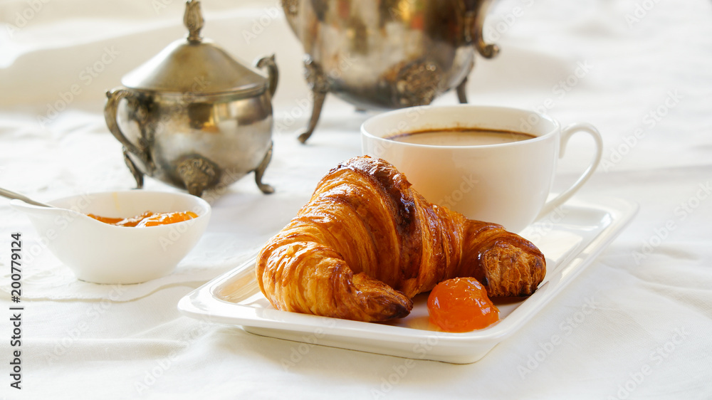 croissant -  buttery, flaky, viennoiserie pastry, made of a layered yeast-leavened dough