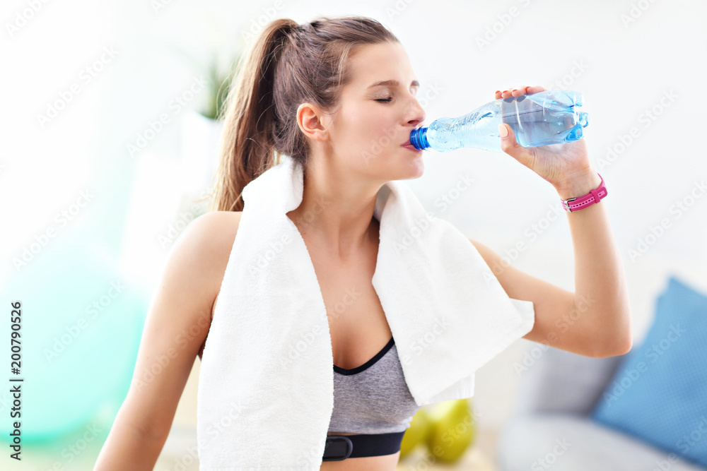 Woman doing fitness exercises at home Woman doing fitness exercises at home