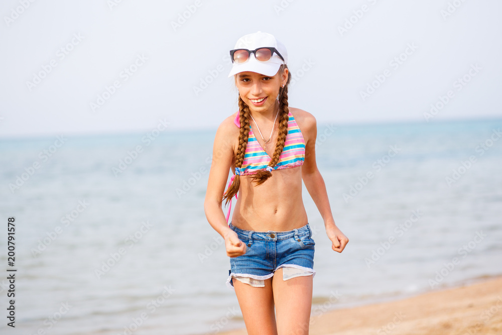 Teenager Girl Enjoying At The Beach 13880405 Stock Photo at Vecteezy