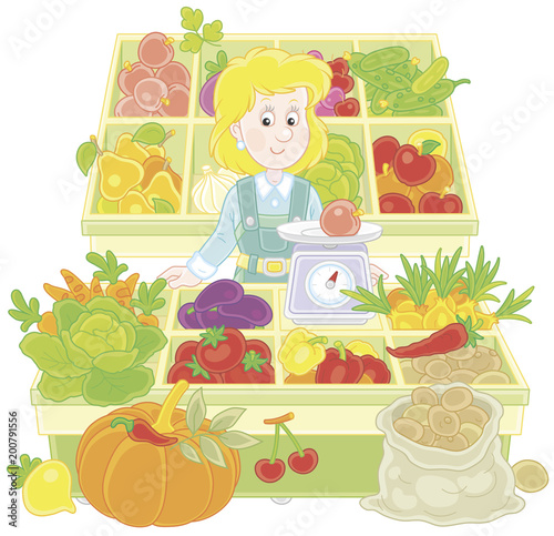 Greengrocer in a market. Sm...