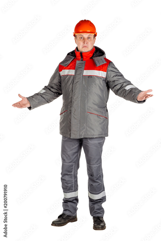 Male builder over white wall background. repair, construction, building, people and maintenance concept. Male builder over white wall background. repair, construction, building, people and maintenance concept.
