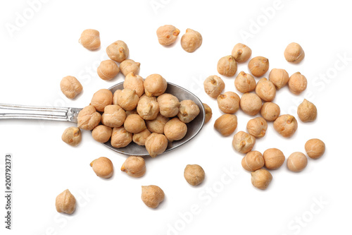 chickpeas in spoon isolated on white background. top view