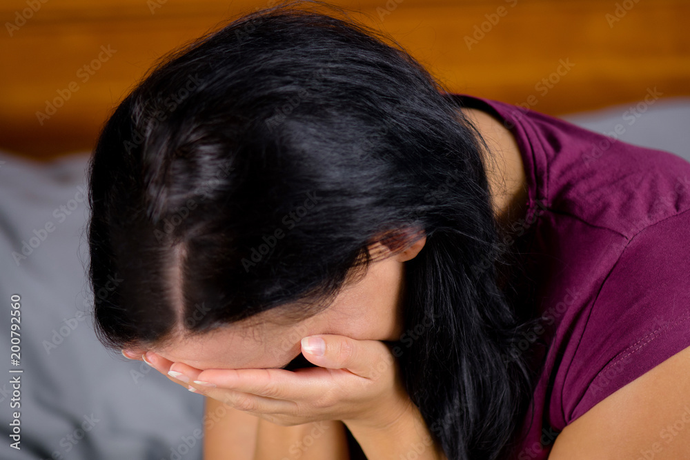 Fototapeta premium The woman is sad and crying.