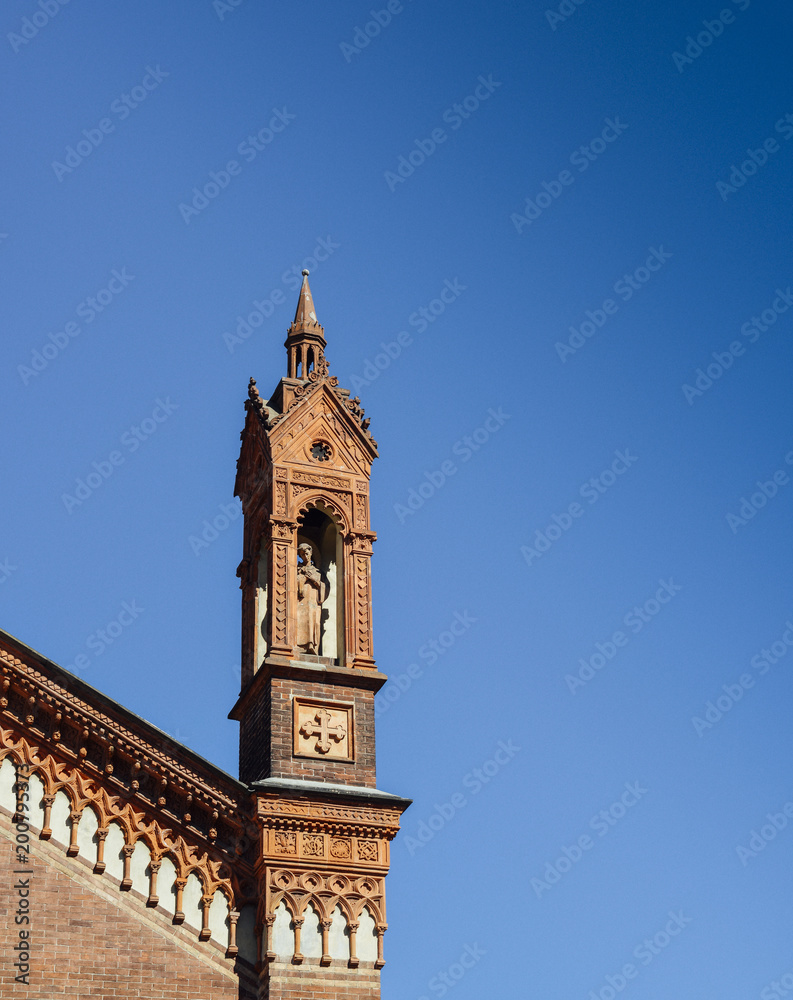 Close up of the front facade of Santa Maria del Carmine Church in Brera neighbourhood of Milan, Italy.