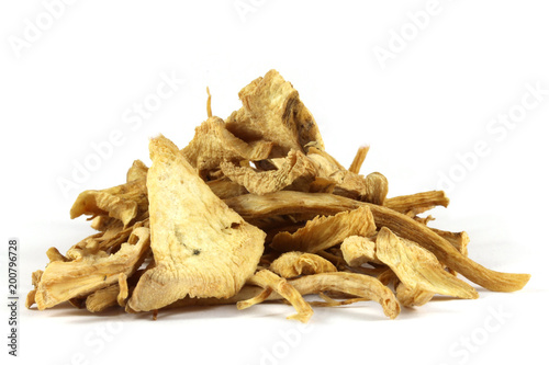Dried root of elecampane (Inula helenium) isolated on white.