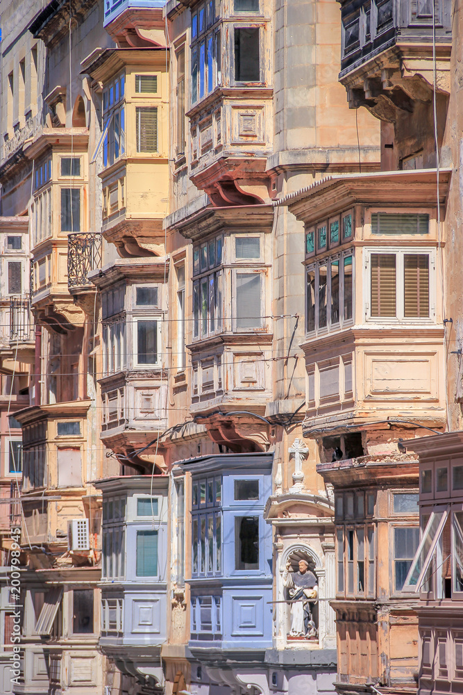 Valletta's colourful bay windows.