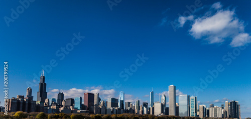 Wide Angle shot of Chicago Skyline with various skyscrapers with a blue sky on a sunny day