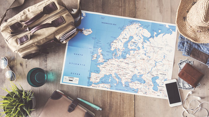 Travel concept on wooden background