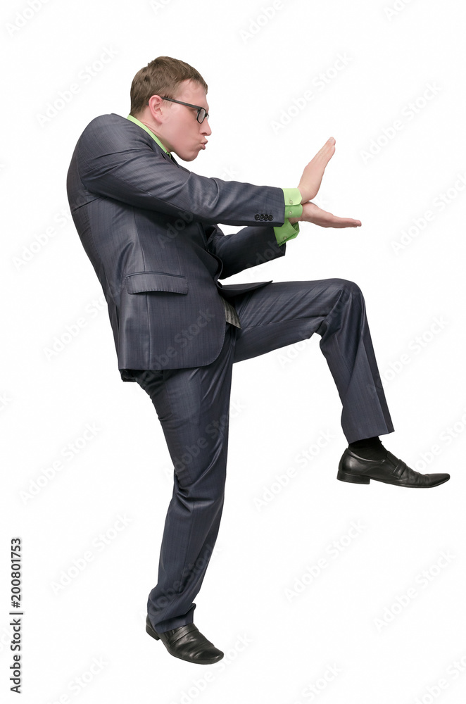 Funny businessman is preparing to fight isolated on white background. Office combat concept. Angry aggressive business man. Funny businessman is preparing to fight isolated on white background. Office combat concept. Angry aggressive business man.