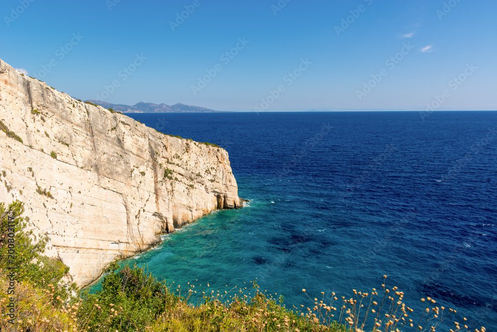 View of beautiful cliff and blue sea near Skinari cape on Zakynthos island. Greece.