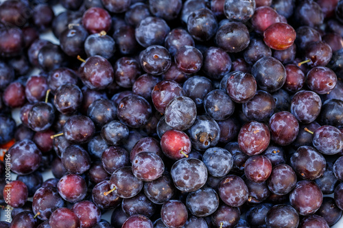 ripe prunes on the market