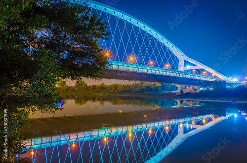 Night view of puente del tercer millenio bridge in Zaragoza, Spain