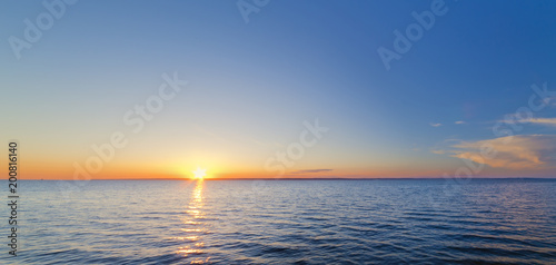 dawn clear sky over clear water / calm seascape Ukraine spring