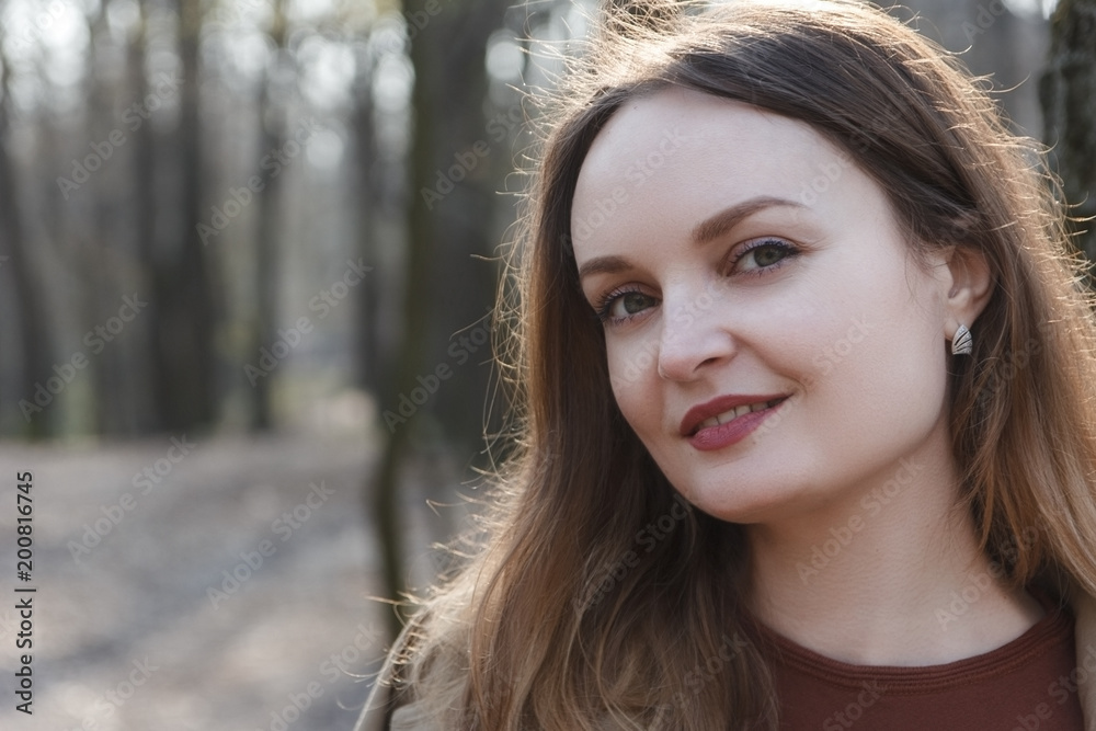 close-up portrait of a girl on the background of a lake on a warm summer day close-up portrait of a girl on the background of a lake on a warm summer day