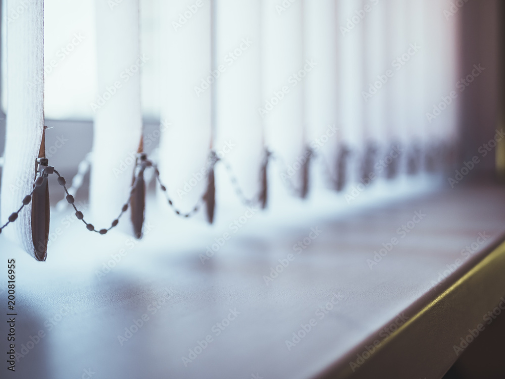 vertical jalousie on the window close up