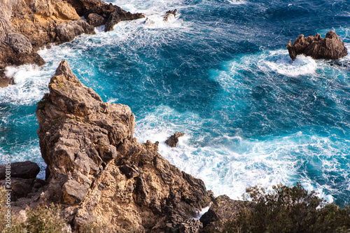 Amazing surging sea among cliffs at Paleokastritsa in Corfu, Greece