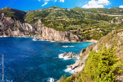 Beautiful beach in a bay at Paleokastritsa in Corfu, Greece