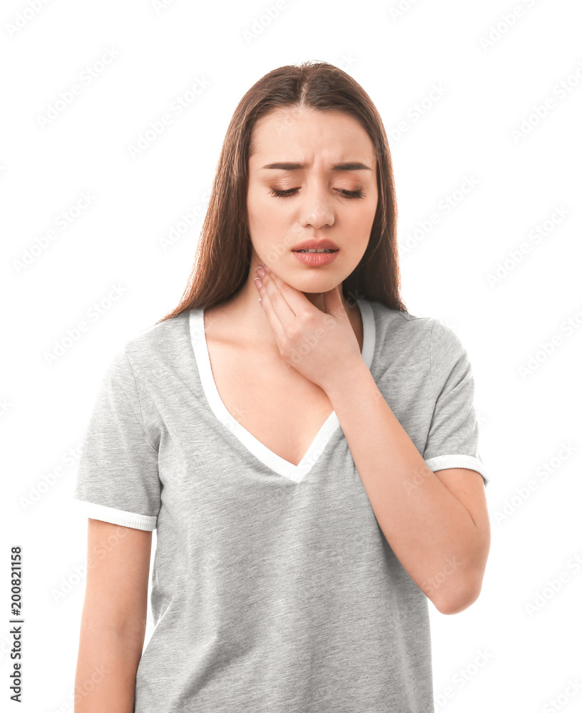 Young woman suffering from sore throat on white background Young woman suffering from sore throat on white background