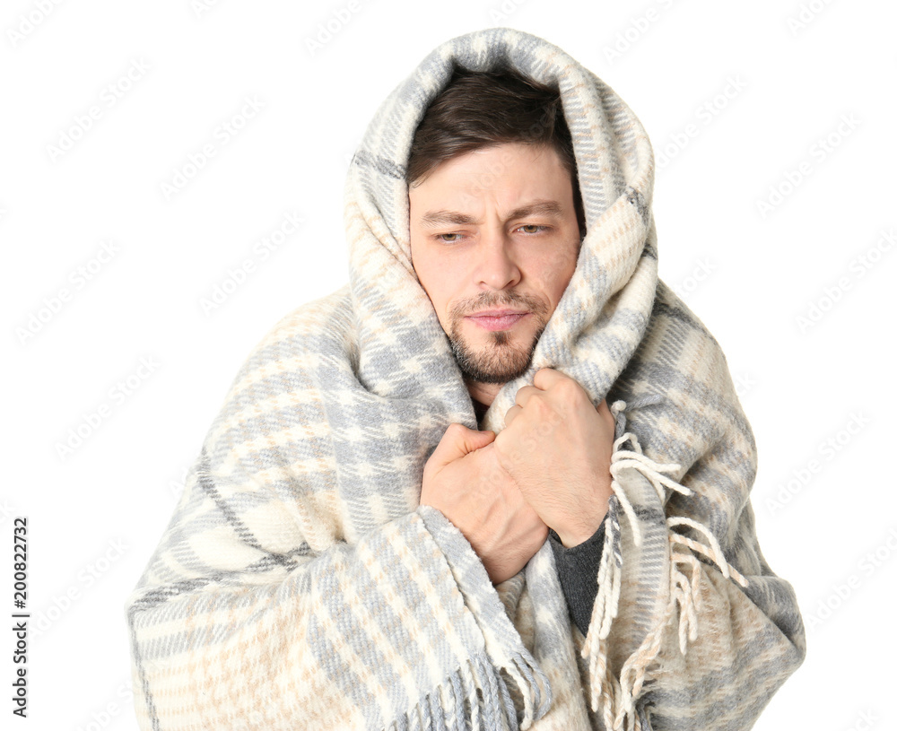 Man wrapped in blanket suffering from cold on white background Stock Photo  | Adobe Stock