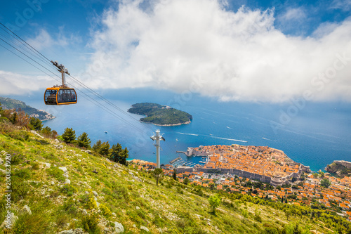 Obraz na płótnie Old town of Dubrovnik with cable car ascending Srd mountain, Dalmatia, Croatia w salonie
