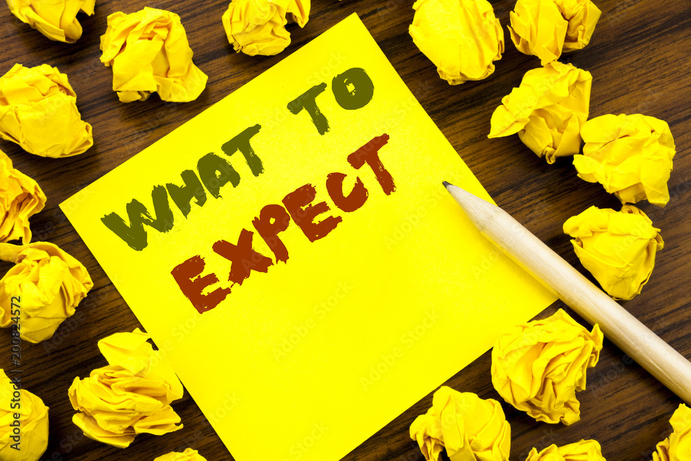 Fototapeta premium Word, writing What To Expect. Business concept for Achieve Expectation Written on sticky note paper, wooden background with folded yellow paper meaning thinking
