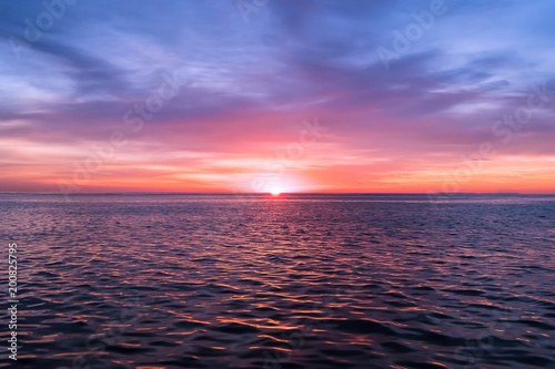 Fototapeta Naklejka Na Ścianę i Meble -  Sunset in the ocean.