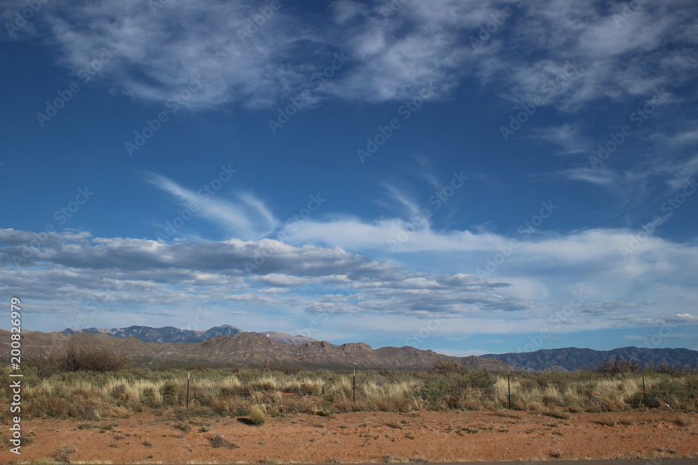 Blue sky white clouds landscape mountains in New Mexico desert