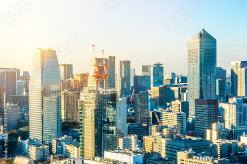 Asia business concept for real estate and corporate construction - panoramic urban city skyline aerial view under twilight sky and golden sun in hamamatsucho  tokyo  Japan