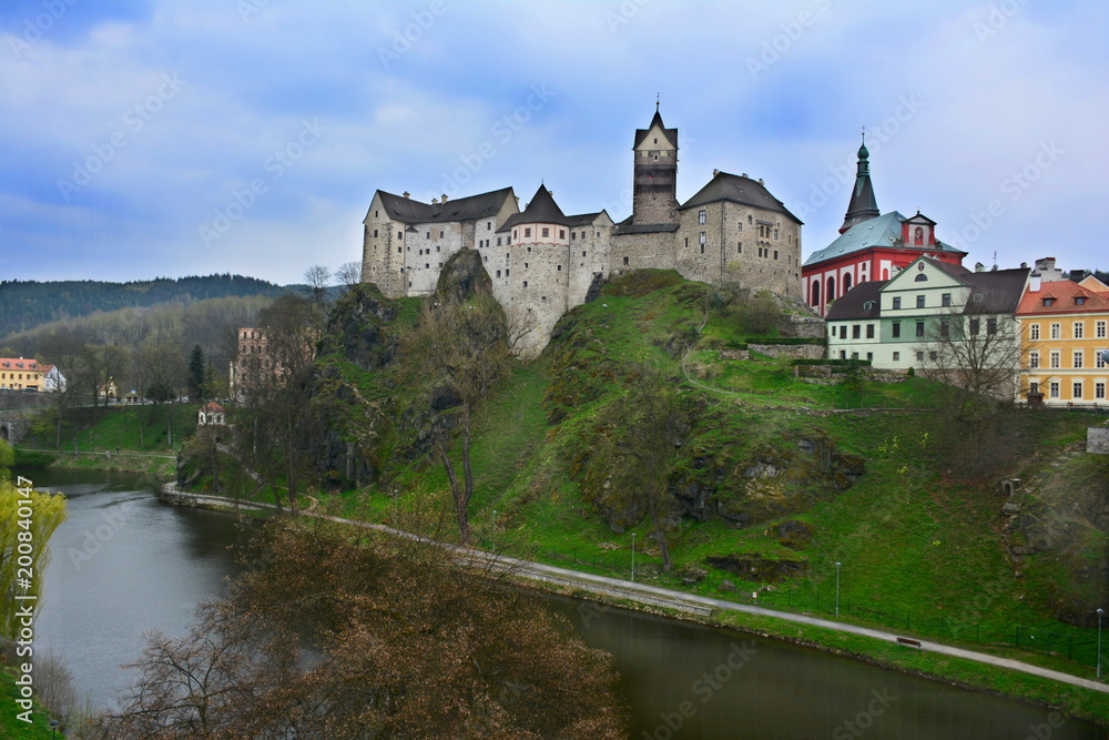 Ancient Czech castle, view over the river. Landscape.