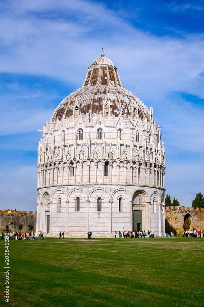 The Pisa Baptistery in Square of Miracles in Pisa, Italy, Europe.    Famous Italian architecture.